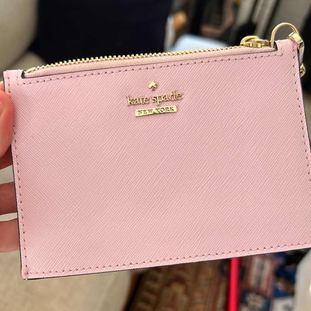 Kate Spade lavender wallet with stripe interior; never been used!